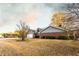 Charming single-story brick home with attached garage and well-maintained front lawn, set in a quiet residential neighborhood at 3874 Carriage Sw Ln, Conyers, GA 30094
