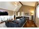 Bright and airy living room with hardwood floors, vaulted ceilings, and modern decor at 3874 Carriage Sw Ln, Conyers, GA 30094
