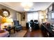 Office featuring natural light, a desk, chair, a stylish light fixture, and decorative wall art at 3874 Carriage Sw Ln, Conyers, GA 30094