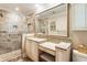 Accessible bathroom featuring a walk-in shower, granite counters, and vanity area at 812 Burning Tree Se Ct, Marietta, GA 30067