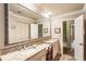 Bathroom featuring double vanity with granite countertops and walk in shower at 812 Burning Tree Se Ct, Marietta, GA 30067