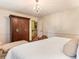 Bedroom featuring a statement armoire, chandelier, and calming color palette at 812 Burning Tree Se Ct, Marietta, GA 30067