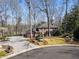 Charming two-story brick home with a well-manicured lawn and beautifully paved driveway at 812 Burning Tree Se Ct, Marietta, GA 30067