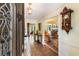 Inviting foyer with hardwood floors, a staircase, and a view of the living room at 812 Burning Tree Se Ct, Marietta, GA 30067