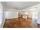 Open-concept living area flows to a kitchen with granite countertops and stainless steel appliances at 3427 Springlake Dr, Decatur, GA 30032