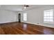 Spacious living room features hardwood floors, fresh white paint, and large windows at 3427 Springlake Dr, Decatur, GA 30032