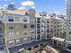 Exterior view of a modern apartment building with multiple balconies at 799 Hammond Dr # 205, Sandy Springs, GA 30328