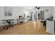 Bright living room boasting hardwood floors, a ceiling fan, and access to the balcony at 799 Hammond Dr # 205, Sandy Springs, GA 30328