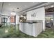 Modern lobby features a reception desk, marble floors, and stylish lighting at 799 Hammond Dr # 205, Sandy Springs, GA 30328