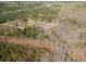 Scenic aerial view of the home nestled among lush trees and the surrounding landscape at 138 Rutledge Rd, Temple, GA 30179