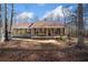 Charming single-story home featuring a cozy front porch and a well-maintained yard at 138 Rutledge Rd, Temple, GA 30179