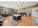 Spacious living room featuring a pool table, leather sofa, and unique decor at 138 Rutledge Rd, Temple, GA 30179