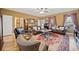Inviting living room with hardwood floors, comfortable seating, and lots of natural light at 138 Rutledge Rd, Temple, GA 30179