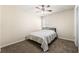 Neutral bedroom featuring a ceiling fan and a comfortable bed, perfect for relaxation at 2145 Red Barn Ct, Cumming, GA 30040
