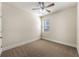Cozy bedroom with neutral carpet, one window, and a ceiling fan at 2145 Red Barn Ct, Cumming, GA 30040