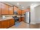 Well-equipped kitchen featuring granite countertops, stainless appliances, and ample cabinet space at 2145 Red Barn Ct, Cumming, GA 30040