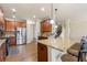 Beautiful kitchen with stainless steel appliances, wood cabinets, and granite countertops at 2145 Red Barn Ct, Cumming, GA 30040