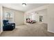 Expansive main bedroom suite featuring a seating area and a full ensuite bathroom at 2145 Red Barn Ct, Cumming, GA 30040