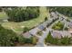 A lovely golf course community featuring mature trees and beautifully landscaped grounds surrounding the homes at 3124 Bentgrass Ln, Kennesaw, GA 30144
