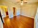 Bedroom with hardwood floors, ceiling fan, closet and ensuite bathroom at 3124 Bentgrass Ln, Kennesaw, GA 30144