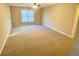 Bonus room with carpet, ceiling fan, neutral paint and large window at 3124 Bentgrass Ln, Kennesaw, GA 30144