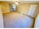 Bonus room with carpet, ceiling fan, neutral paint and large window at 3124 Bentgrass Ln, Kennesaw, GA 30144