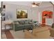 Bright living room with hardwood floors, a neutral color scheme, and a view to the kitchen at 3124 Bentgrass Ln, Kennesaw, GA 30144
