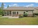 This home has a screened porch and patio for enjoying the manicured lawn and outdoor seating at 3124 Bentgrass Ln, Kennesaw, GA 30144