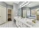 Bathroom features double sinks, a walk-in closet, and a separate tub at 5163 Holly Springs Dr, Douglasville, GA 30135