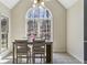 Dining room with a large window offering natural light and views at 5163 Holly Springs Dr, Douglasville, GA 30135
