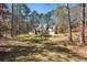 Beautiful single-Gathering home nestled among mature trees on a sprawling lot at 5163 Holly Springs Dr, Douglasville, GA 30135