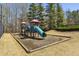 Neighborhood playground with slides and play structures, perfect for children at 5163 Holly Springs Dr, Douglasville, GA 30135