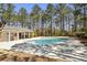 Community pool with a pool house, a lounge area, and ample space for relaxation at 5163 Holly Springs Dr, Douglasville, GA 30135