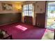 Cozy living room with a view of the front yard at 198 Lexington Ct, Riverdale, GA 30274