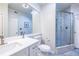Contemporary bathroom featuring a single sink vanity and glass enclosed shower stall at 240 Renaissance Ne Pkwy # 106, Atlanta, GA 30308