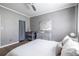 Comfortable bedroom featuring a crib, neutral tones, and ample natural light at 240 Renaissance Ne Pkwy # 106, Atlanta, GA 30308