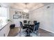 Well-lit dining area featuring a modern chandelier and stylish decor at 240 Renaissance Ne Pkwy # 106, Atlanta, GA 30308