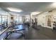 A fully equipped fitness center with a variety of exercise machines and free weights at 240 Renaissance Ne Pkwy # 106, Atlanta, GA 30308