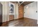 Bedroom with hardwood floors, brick accent wall and industrial ceiling at 3235 Roswell Ne Rd # 421, Atlanta, GA 30305