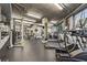 Well-equipped gym with treadmills, weights, and mirror at 3235 Roswell Ne Rd # 421, Atlanta, GA 30305