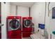 This laundry room features modern washer and dryer, paint storage and room for cleaning supplies at 3235 Roswell Ne Rd # 421, Atlanta, GA 30305