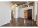 Spacious living room area with hardwood floors and access to other rooms at 3235 Roswell Ne Rd # 421, Atlanta, GA 30305
