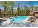 A spacious community pool with plenty of lounge chairs and sitting areas at 3235 Roswell Ne Rd # 421, Atlanta, GA 30305