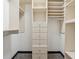 The walk-in closet has custom shelving, drawers, and plenty of storage space at 3235 Roswell Ne Rd # 421, Atlanta, GA 30305