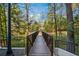 A long wooded bridge for residents to enjoy the beautiful wooded surroundings at 3235 Roswell Ne Rd # 421, Atlanta, GA 30305