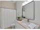 Clean bathroom with neutral colors, vanity, and a shower-tub combination at 5805 Clarion St., Cumming, GA 30040