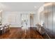 Open foyer with hardwood floors, staircase, and views into the dining and living areas at 5805 Clarion St., Cumming, GA 30040