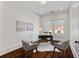 Well-lit office space with hardwood floors and a view of the neighborhood at 5805 Clarion St., Cumming, GA 30040