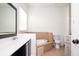 Bright bathroom features a soaking tub, tile surround, and modern vanity with a dark wood base at 1112 Park S Row, Atlanta, GA 30312