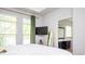 Bright bedroom with large windows, en-suite bathroom, and minimalist decor at 1112 Park S Row, Atlanta, GA 30312